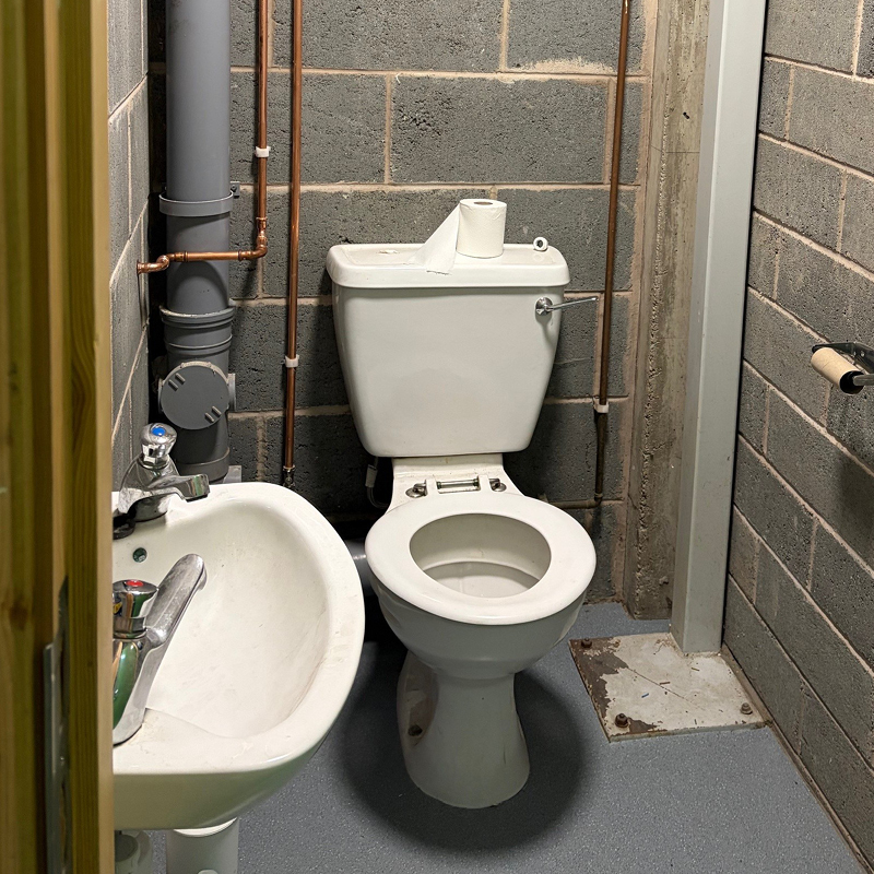 A new WC and sanitaryware being installed by Watsons Building Services
